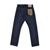 Dark blue jeans with a brand label on the back pocket against a white background