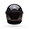 Black motorcycle helmet with brown interior on a white background
