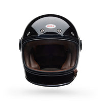 Black motorcycle helmet with brown interior on a white background