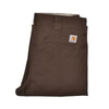 Folded brown pants with a Carhartt logo on a white background