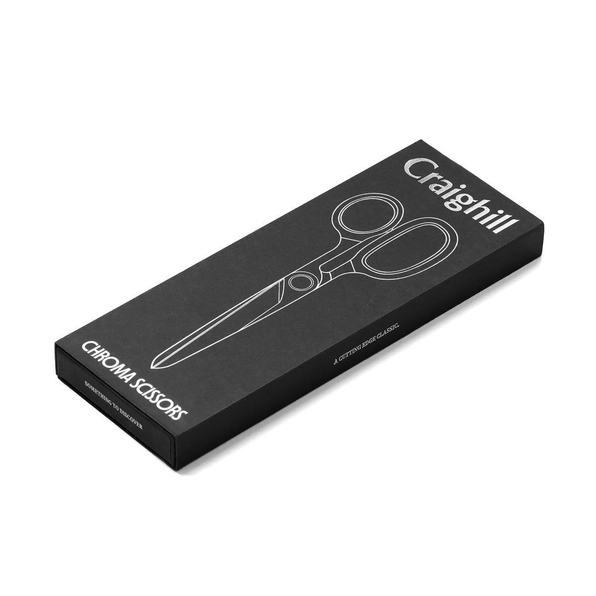 Black box with white text and a graphic of scissors on a white background