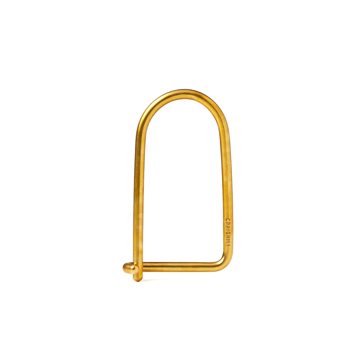 Brass U-shaped metal bracket on a white background