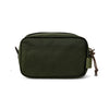 Green toiletry bag with zippers on a white background