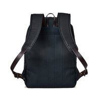 Black backpack with leather straps on a white background