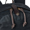 Black backpack with leather straps and brand logo on a white background