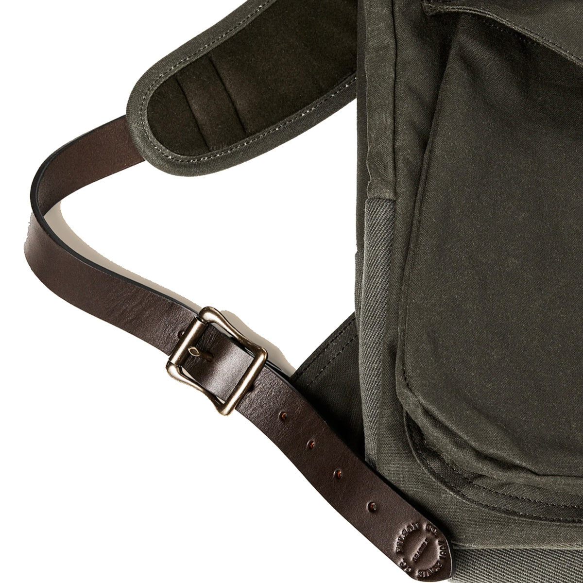Green backpack with a brown leather strap and buckle on a white background