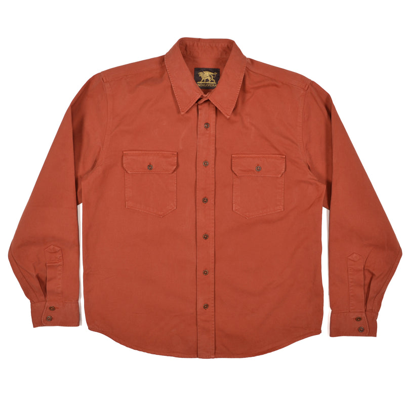 Orange shirt with a brand logo on a white background