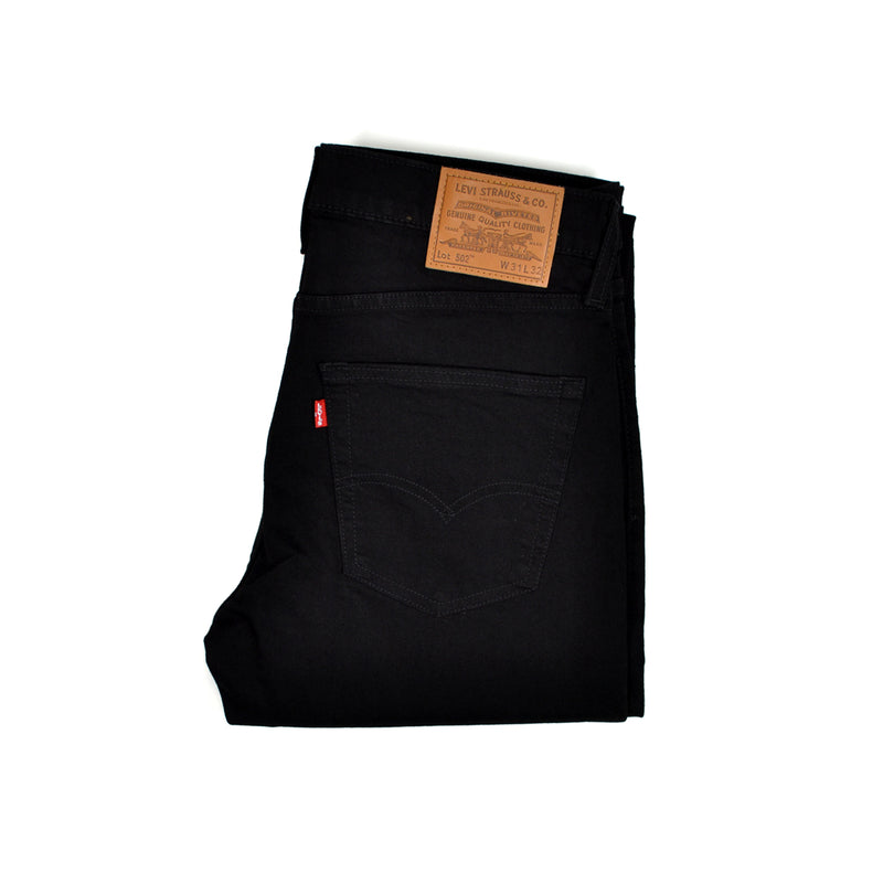 Black Levi's jeans with a visible brand label on a white background