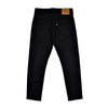 Black jeans with a visible brand tag on a white background