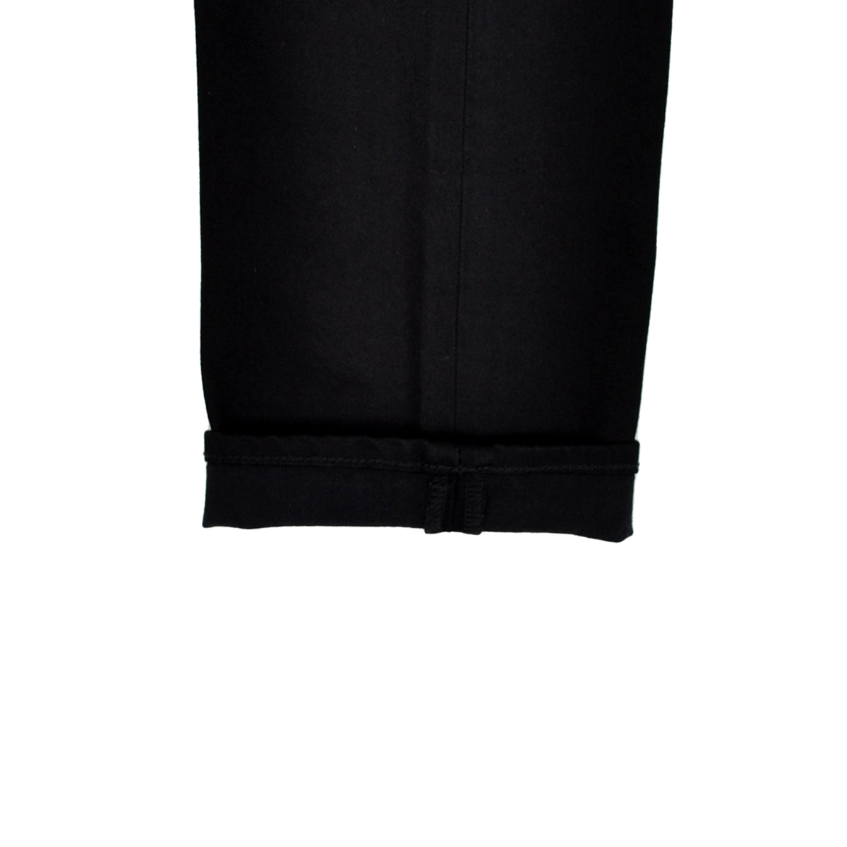 Close-up of a black fabric edge on a white background