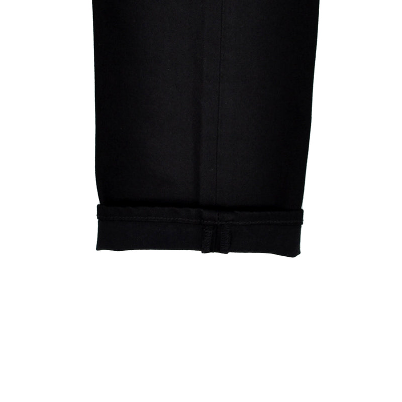Close-up of a black fabric edge on a white background