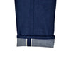 Close-up of blue denim fabric with a white background