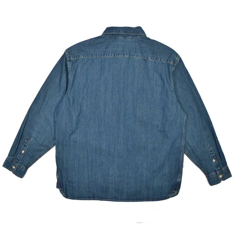 Blue denim shirt on a white background