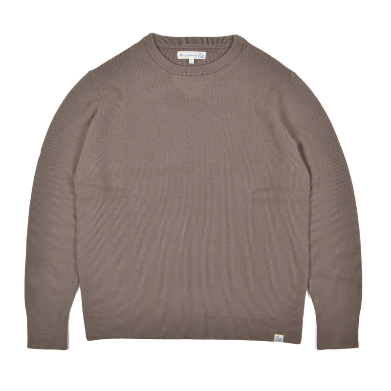 Brown sweater on a white background