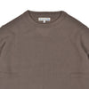 Brown sweater with a visible brand label on a white background