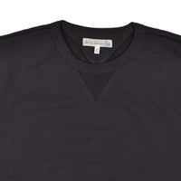 Black sweatshirt with a brand label on a white background