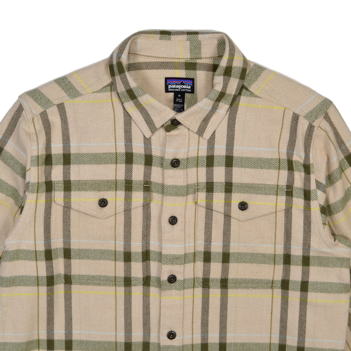 Plaid shirt with visible Patagonia logo on a white background