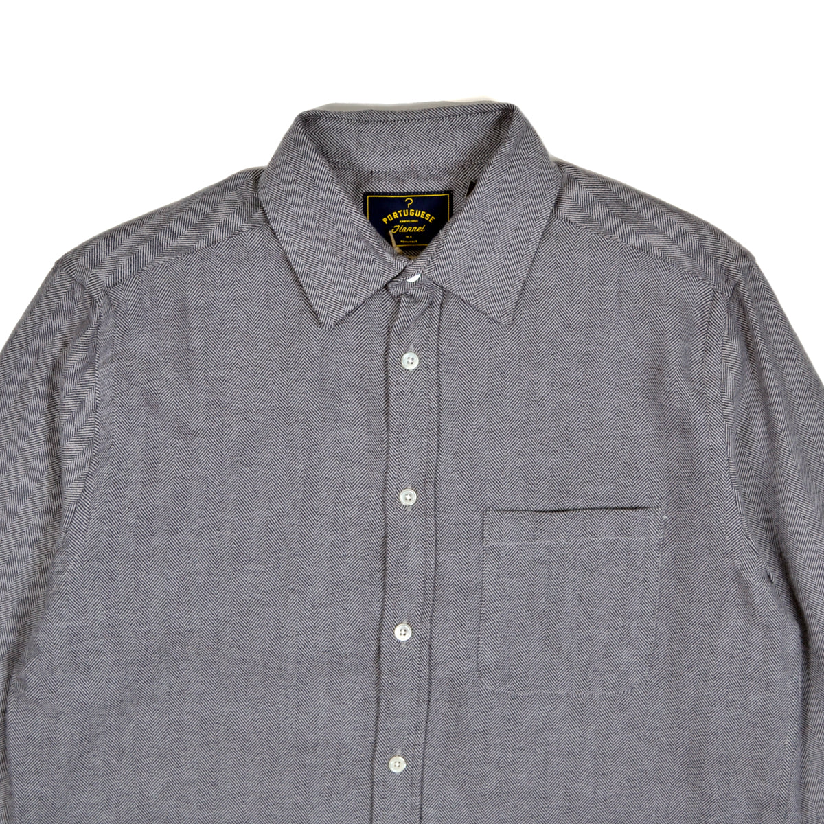Gray button-up shirt with a collar on a white background