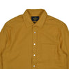 Yellow shirt with a collar and buttons on a white background