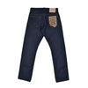 Dark blue jeans with a brand label on the back pocket against a white background