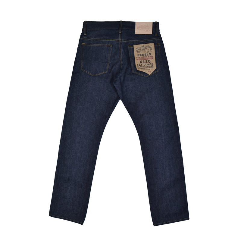 Dark blue jeans with a brand label on the back pocket against a white background