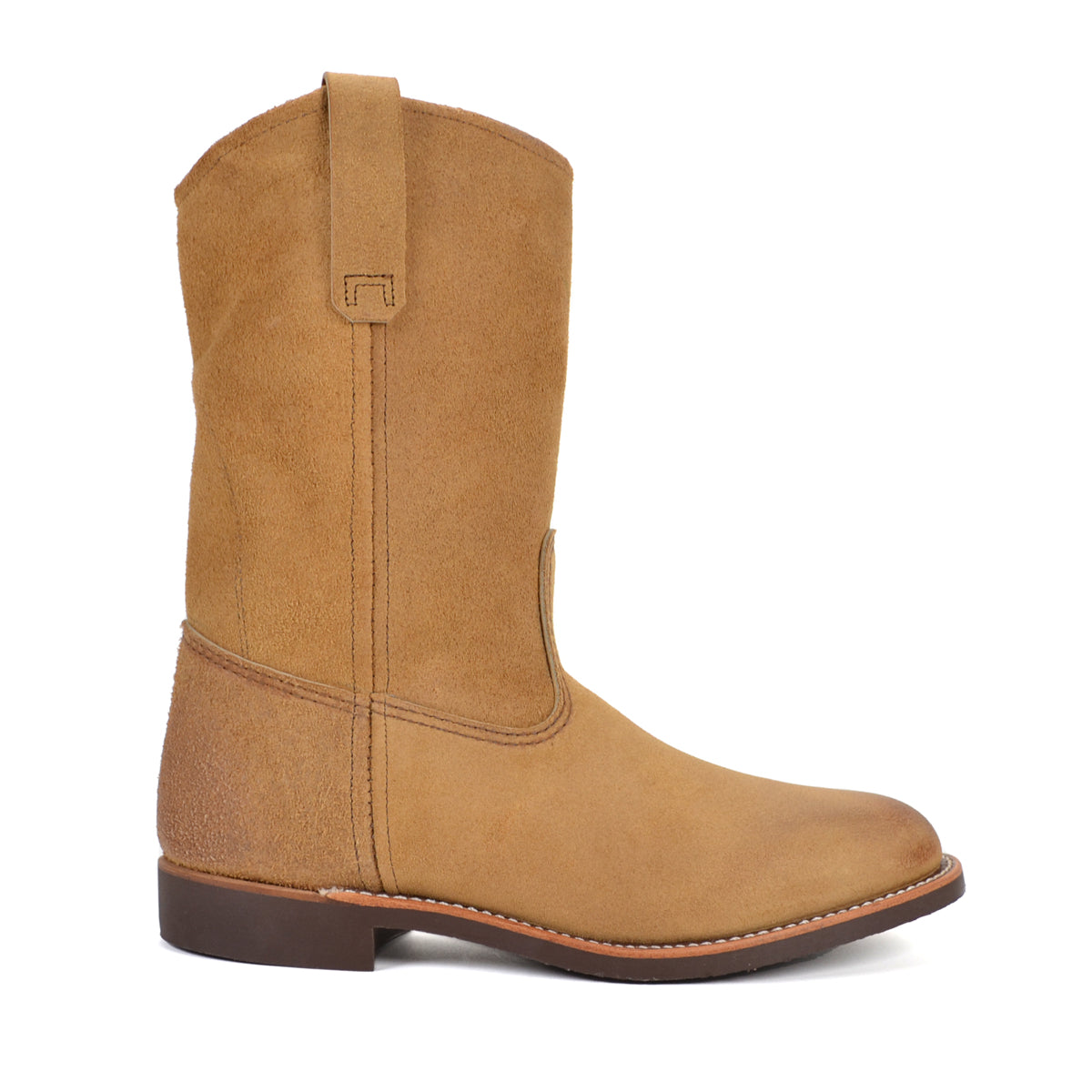 Tan cowboy boot on a white background