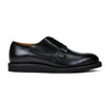 Pair of black leather shoes on a white background
