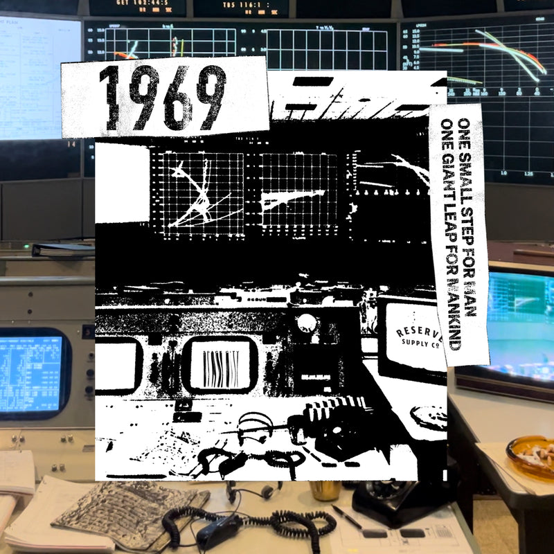 Close up of t-shirt graphic with 'Reserve Supply Space City' design in a retro-tech setting