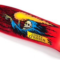 Skateboard deck with a graphic of a skeleton and sunset, featuring the name Corey O'Brien.