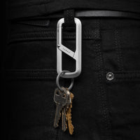 Keychain with keys attached to a black pants belt loop