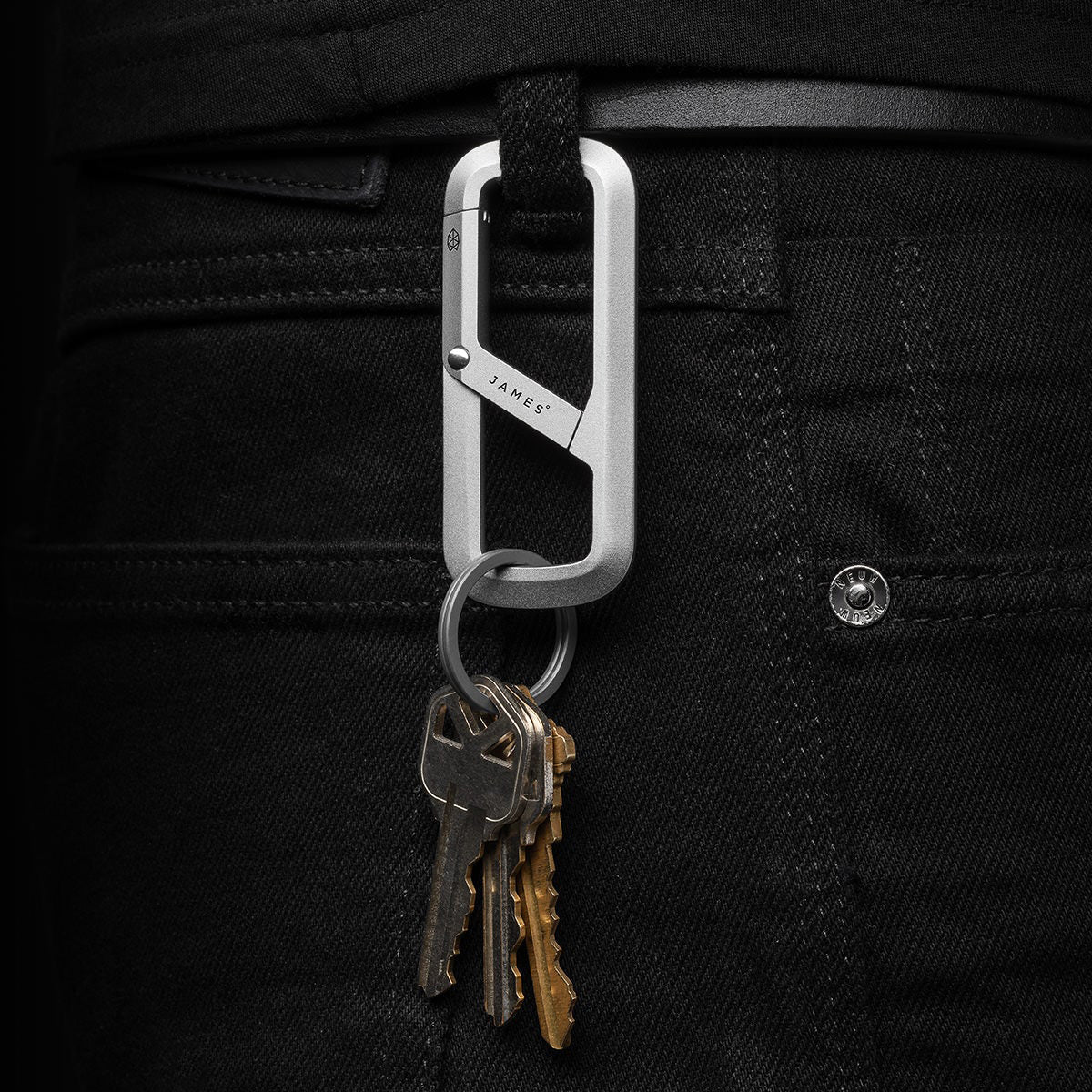 Keychain with keys attached to a black pants belt loop