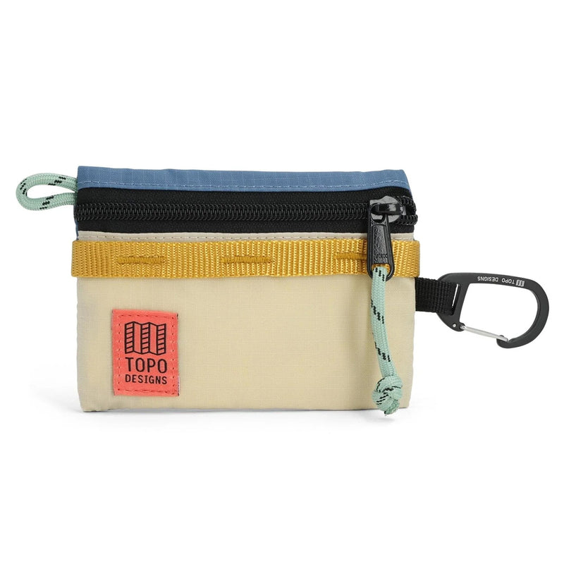 Small pouch with multiple zippers and carabiners on a white background, featuring Topo Designs branding.