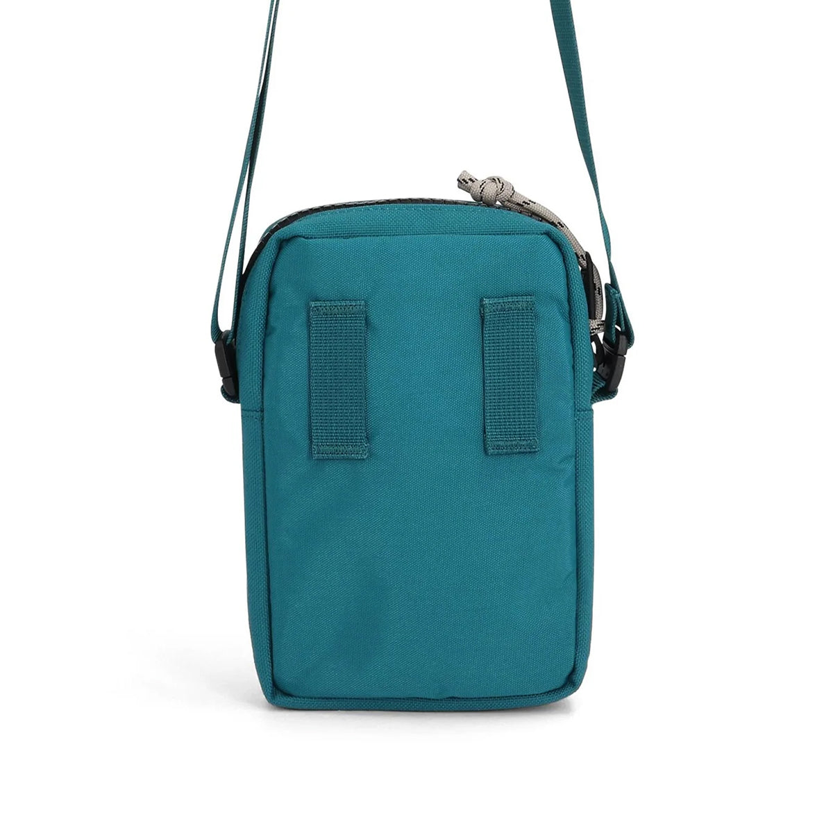 Teal crossbody bag with two straps on a white background