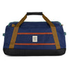 Blue duffel bag with brown straps on a white background