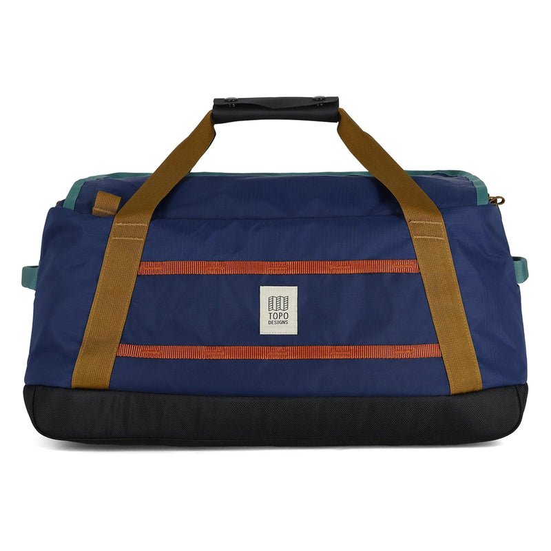 Blue duffel bag with brown straps on a white background