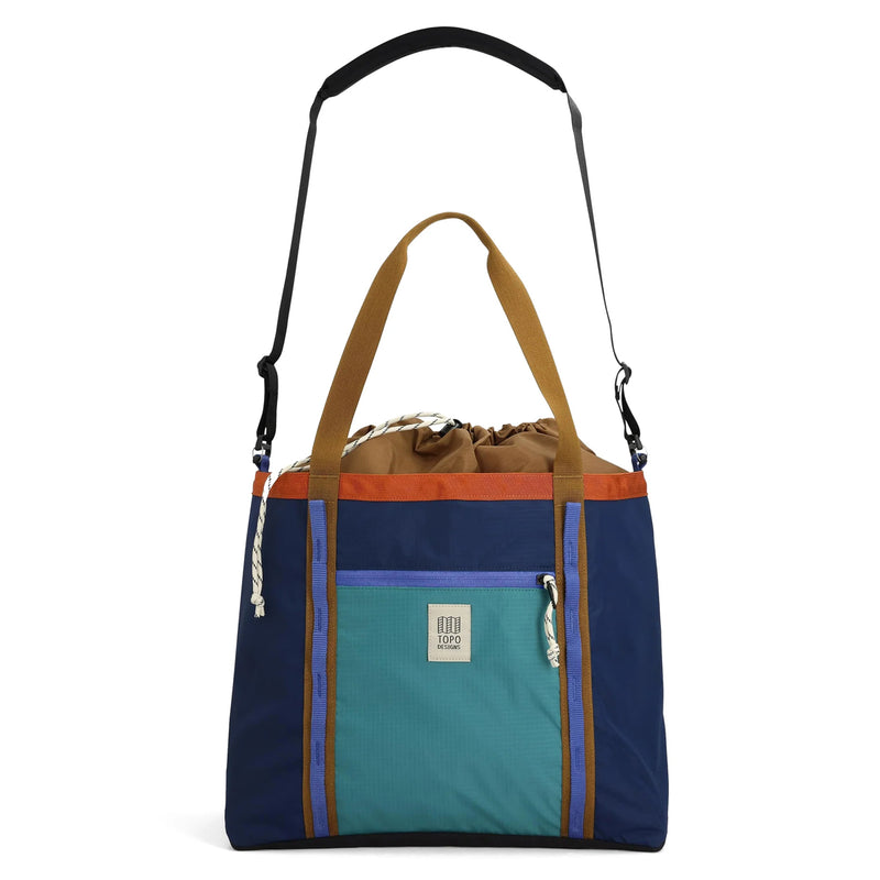 Multicolored tote bag with a drawstring top on a white background
