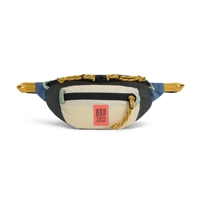 Multicolored waist pack with a visible brand label on a white background