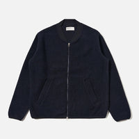 Navy blue zip-up jacket on a light gray background