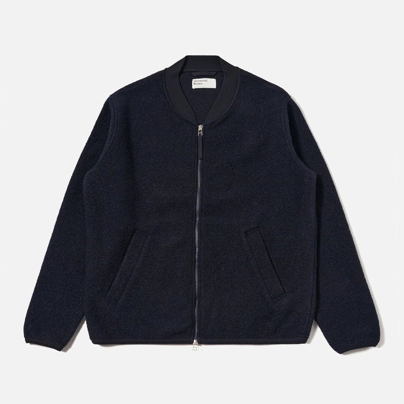 Navy blue zip-up jacket on a light gray background