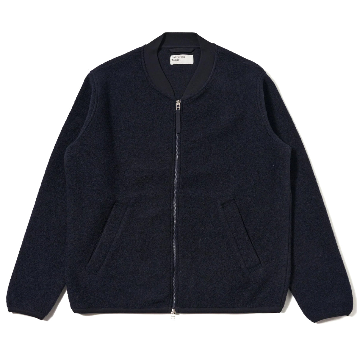 Navy blue zip-up jacket on a white background
