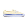 Light off-white sneaker with blue sole on a white background