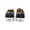 Black sneakers with camouflage pattern on the sides on a white background
