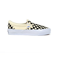 Checkered slip-on sneaker with white sole on a white background